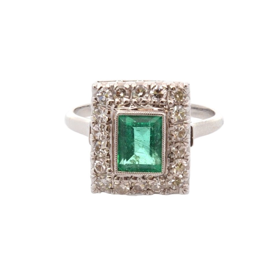 Bague Entourage en platine, émeraude, et diamants - Castafiore