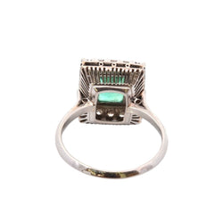 Bague Entourage en platine, émeraude, et diamants - Castafiore