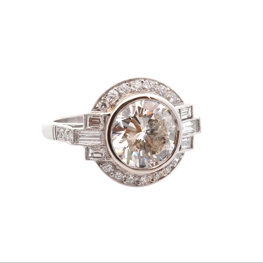 Bague Entourage en platine et diamants - Castafiore