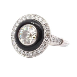 Bague Entourage en platine, onyx et diamants - Castafiore