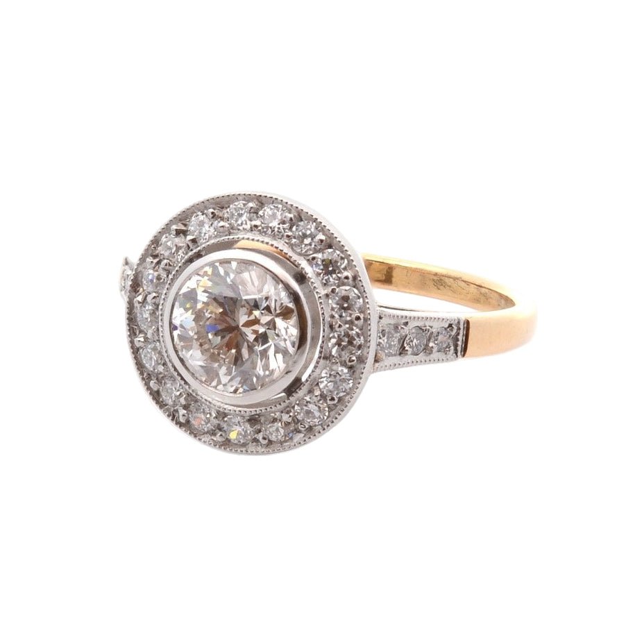 Bague Entourage en platine, or jaune, et diamants - Castafiore