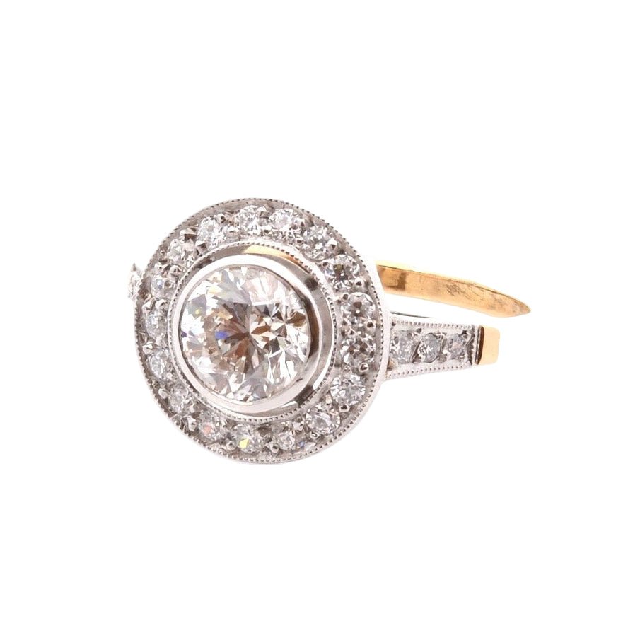 Bague Entourage en platine, or jaune, et diamants - Castafiore