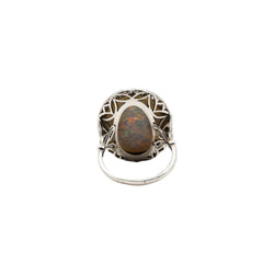 Bague Entourage en platine, or jaune, opale et diamants