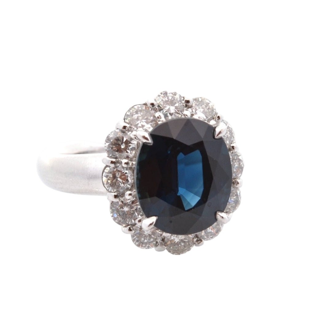 Bague Entourage en platine, saphir et diamants - Castafiore