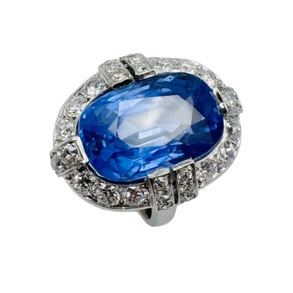 Bague Entourage en platine, saphir et diamants - Castafiore