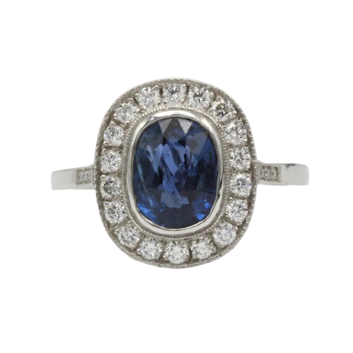 Bague Entourage en platine, saphir et diamants - Castafiore