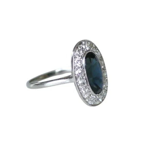 Bague Entourage en platine, saphir et diamants - Castafiore