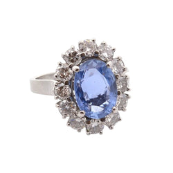 Bague Entourage en platine, saphir et diamants - Castafiore