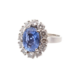Bague Entourage en platine, saphir et diamants - Castafiore