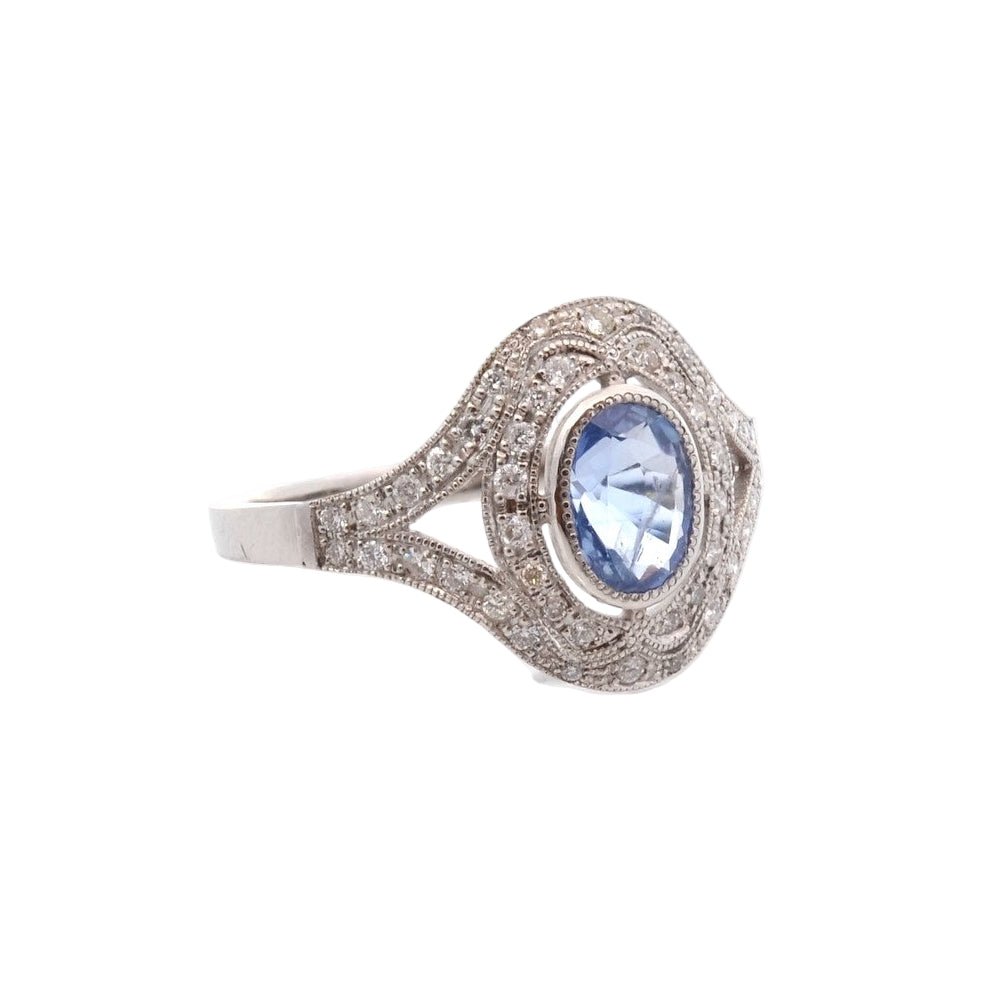 Bague Entourage en platine, saphir, et diamants - Castafiore