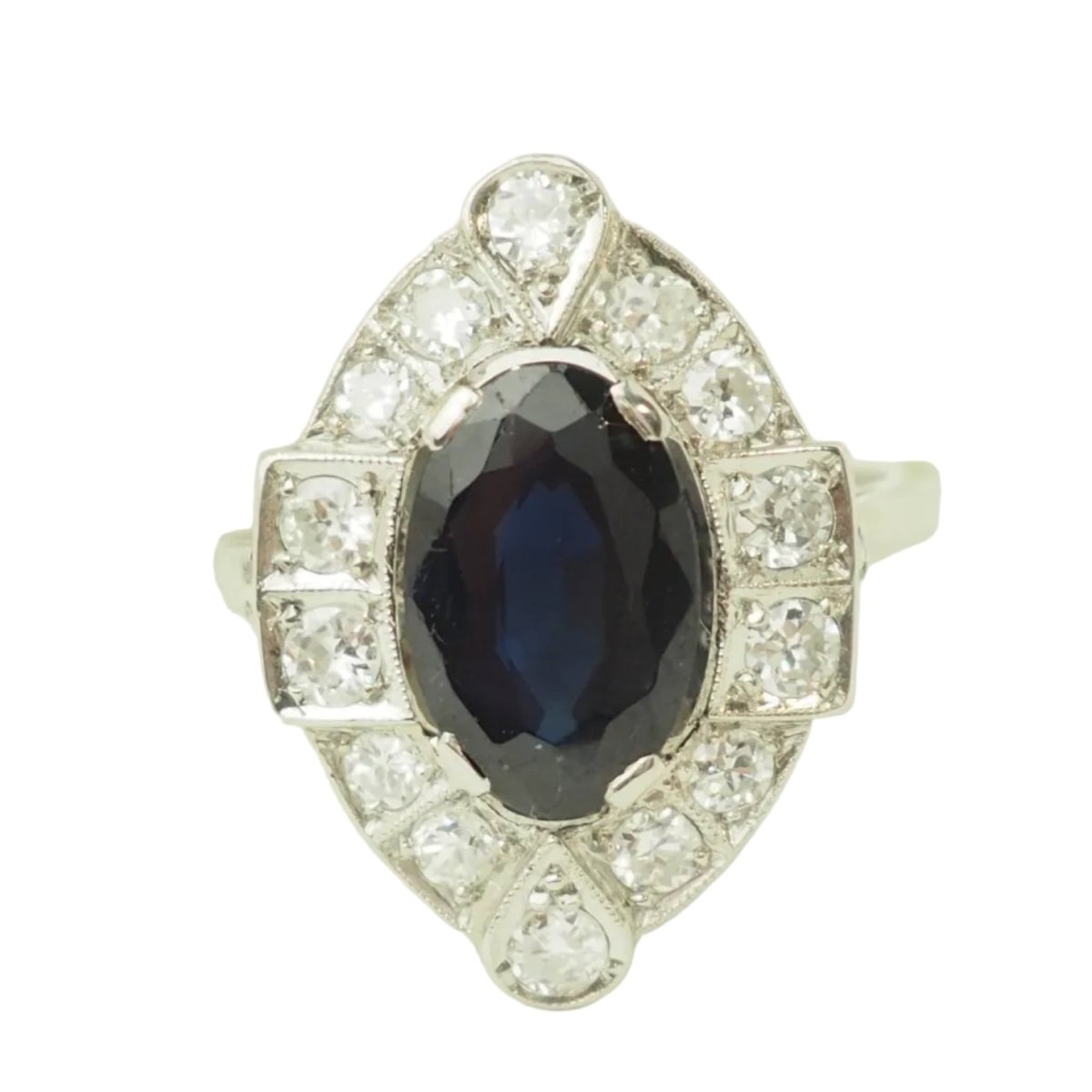 Bague Entourage en Platine, saphir, et diamants - Castafiore
