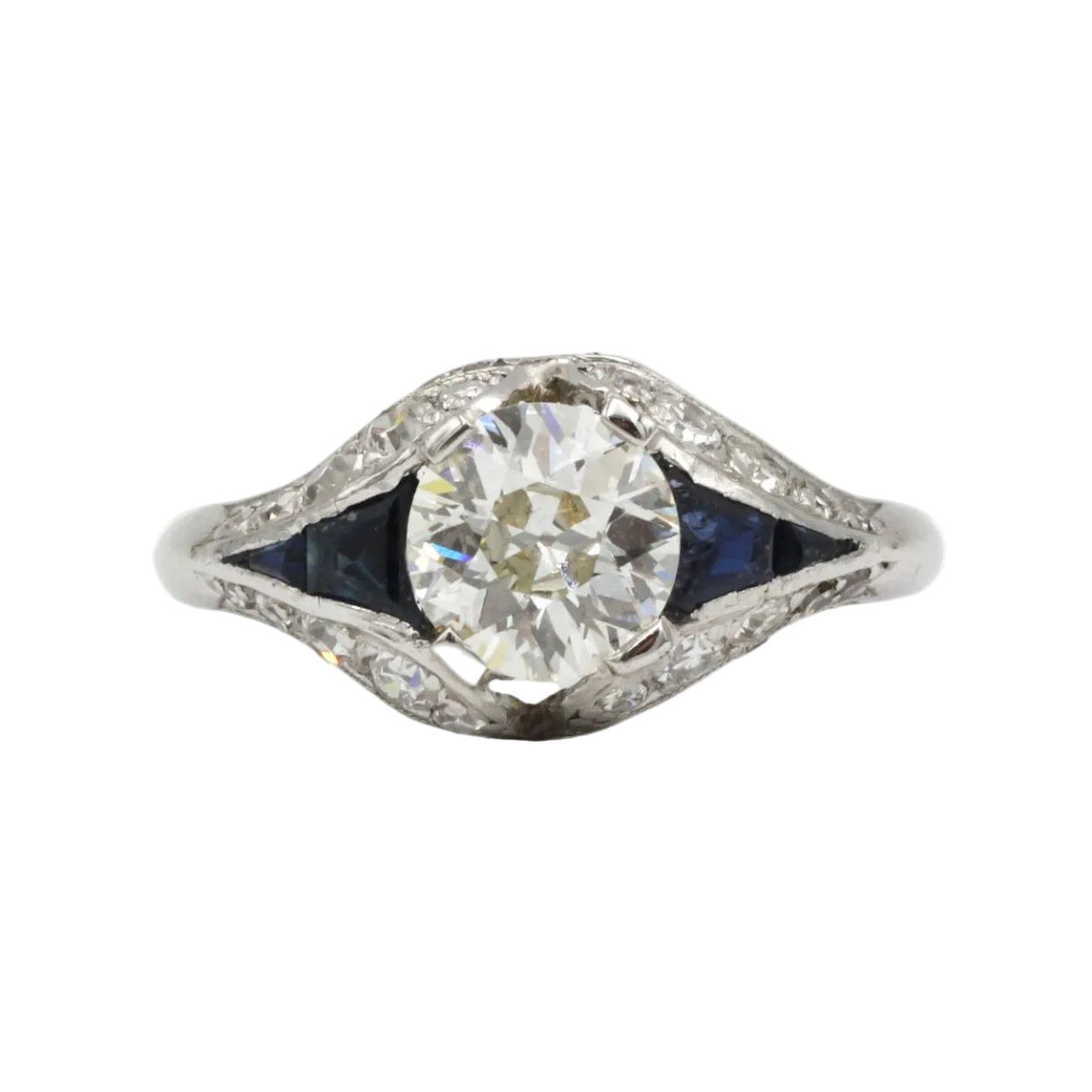 Bague Entourage en platine, saphirs et diamants - Castafiore