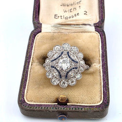 Bague Entourage en platine, saphirs et diamants - Castafiore