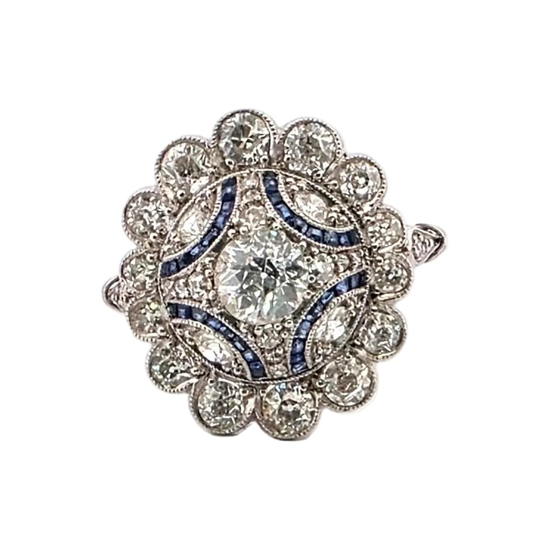Bague Entourage en platine, saphirs et diamants - Castafiore
