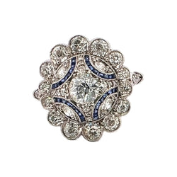 Bague Entourage en platine, saphirs et diamants - Castafiore