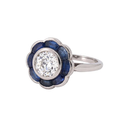 Bague Entourage en platine, saphirs et diamants - Castafiore