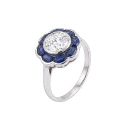 Bague Entourage en platine, saphirs et diamants - Castafiore