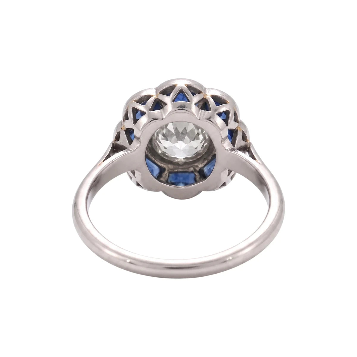 Bague Entourage en platine, saphirs et diamants - Castafiore