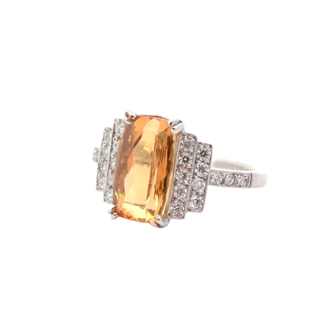 Bague entourage en platine, topaze et diamants - Castafiore