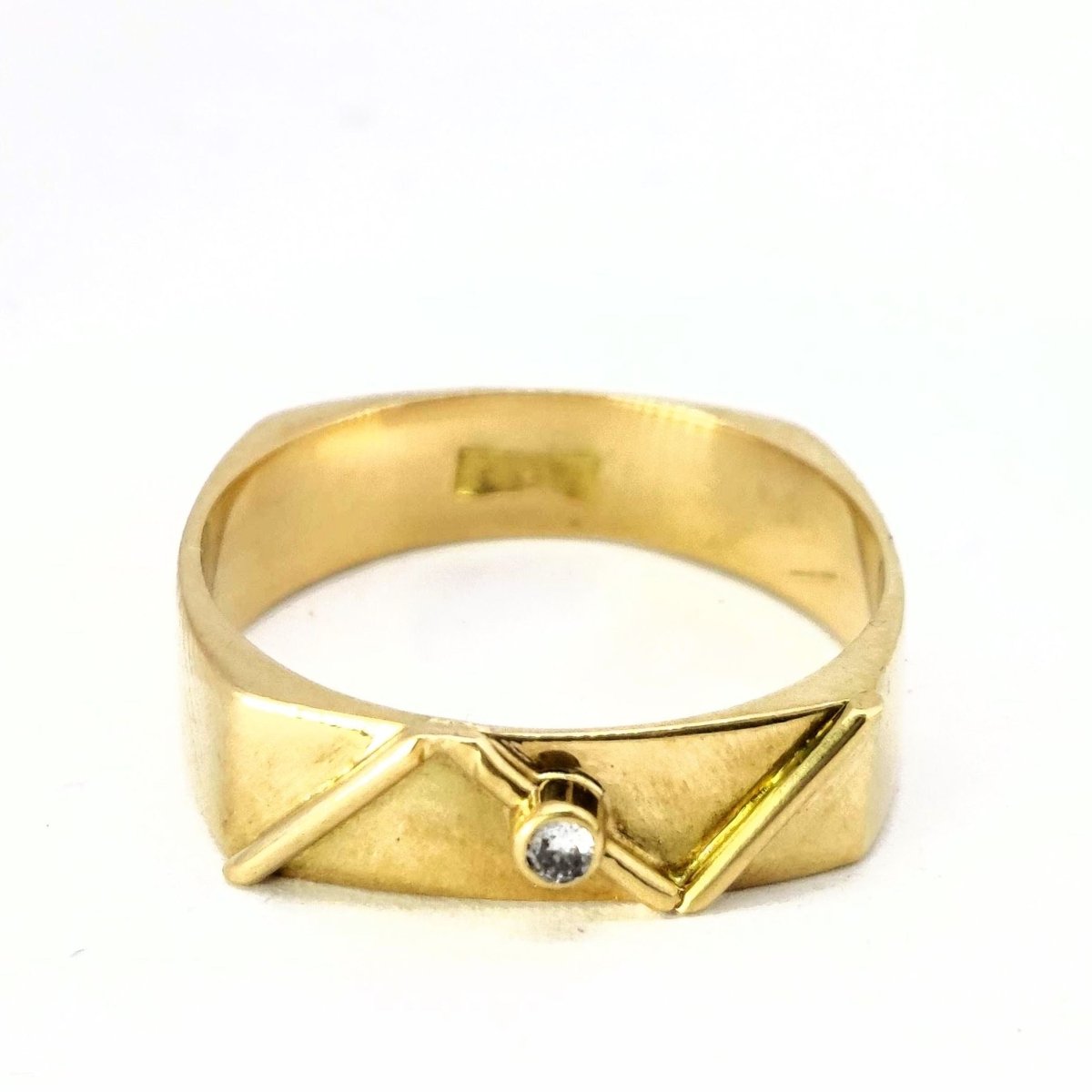Bague géométrique en or jaune et diamant - Castafiore