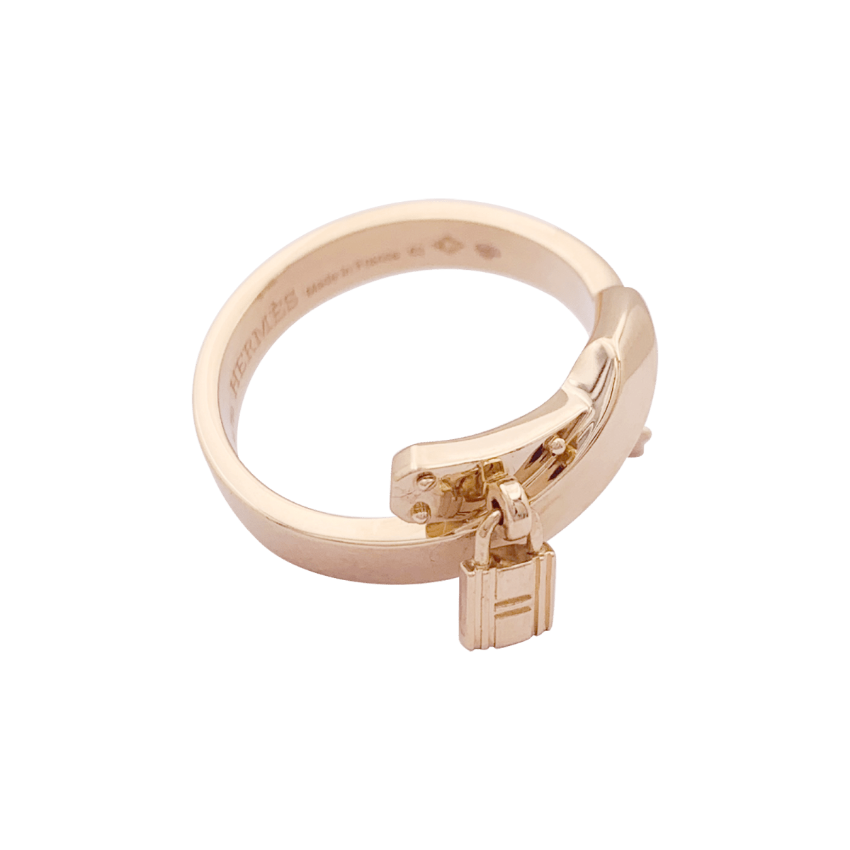 Bague HERMES "Kelly Gavroche" or rose. - Castafiore