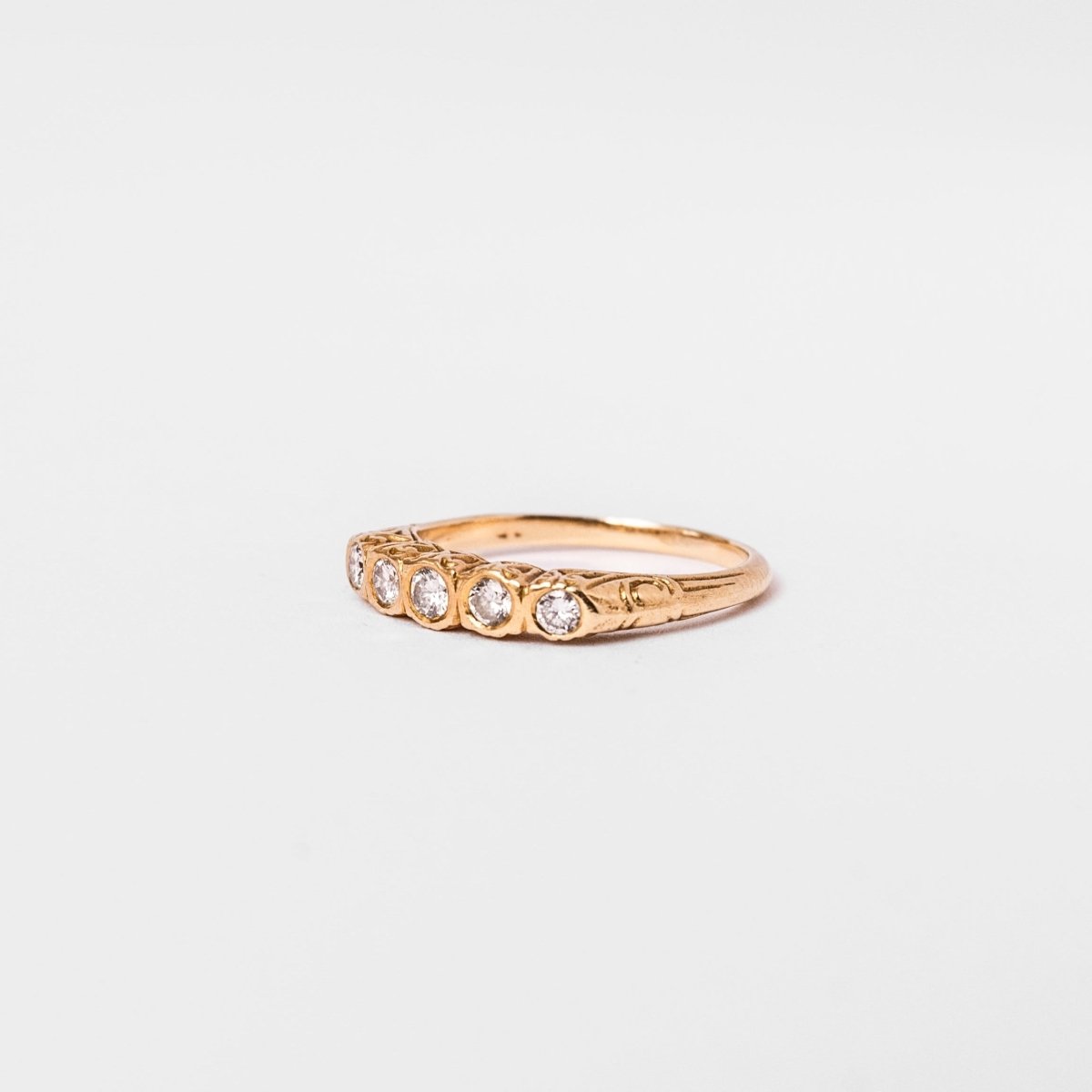 Bague Jarretière en or jaune et diamants - Castafiore