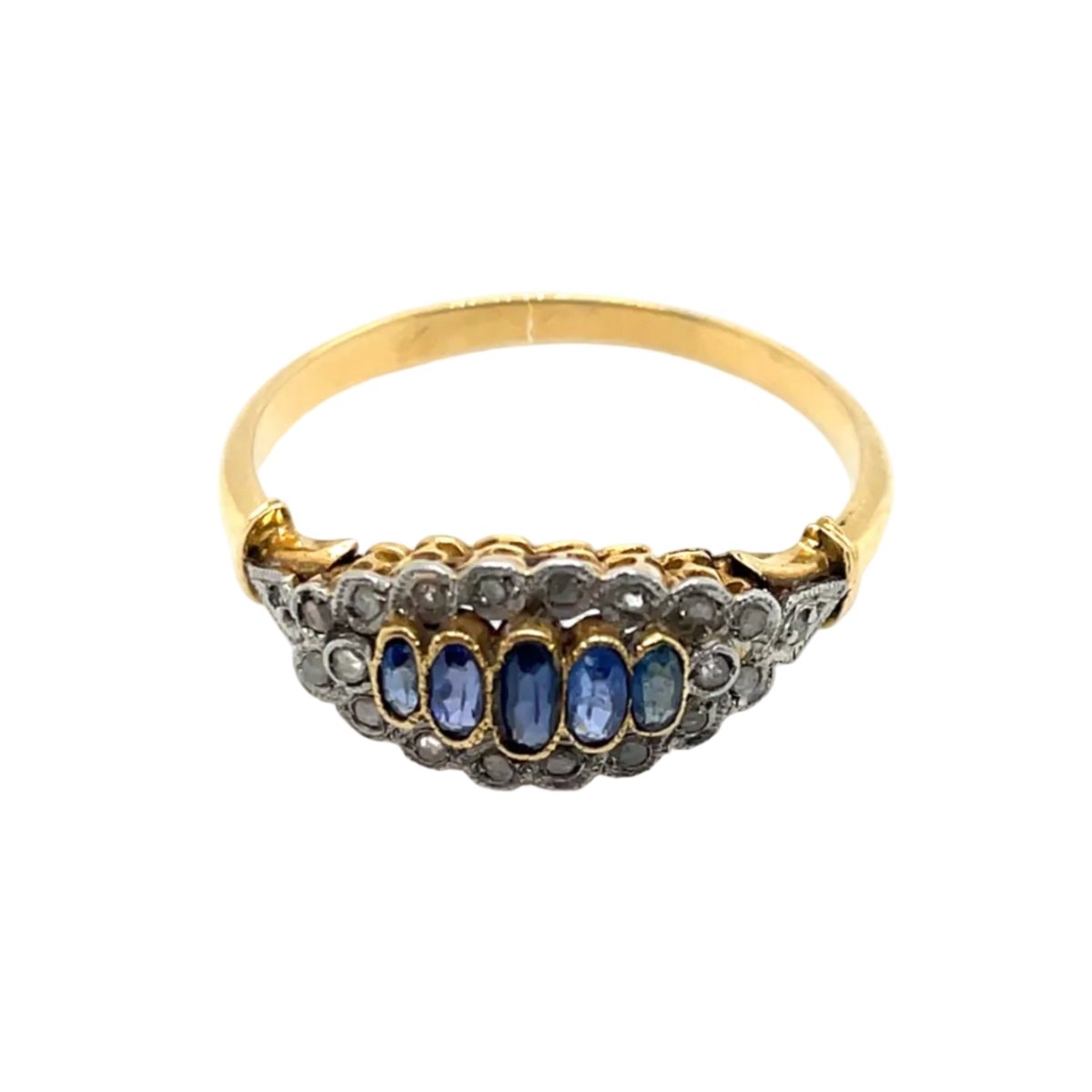 Bague Jarretière en or jaune, or blanc, saphirs et diamants