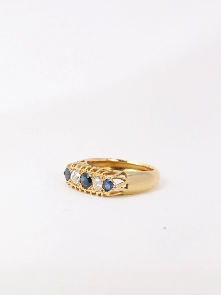 Bague jarretière or jaune saphirs diamants taille ancienne - Castafiore