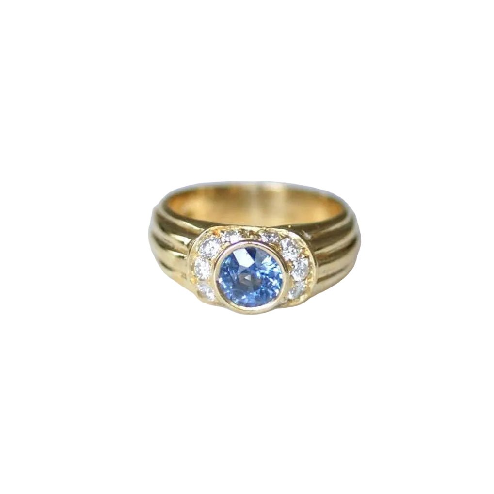 Bague jonc en or jaune, saphir, et diamants - Castafiore