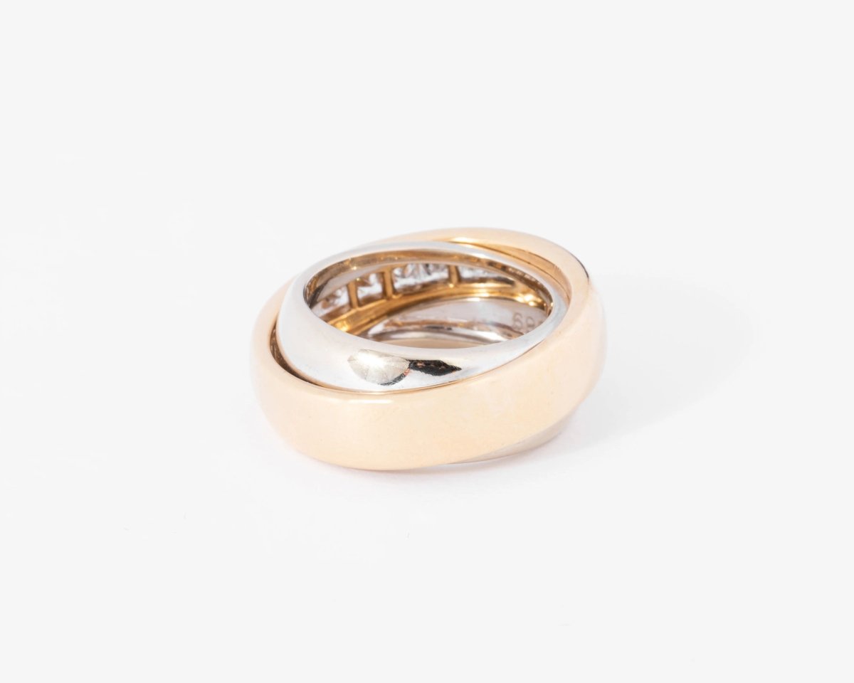 Bague jonc signée Cartier bi-colore en diamants princesses - Castafiore