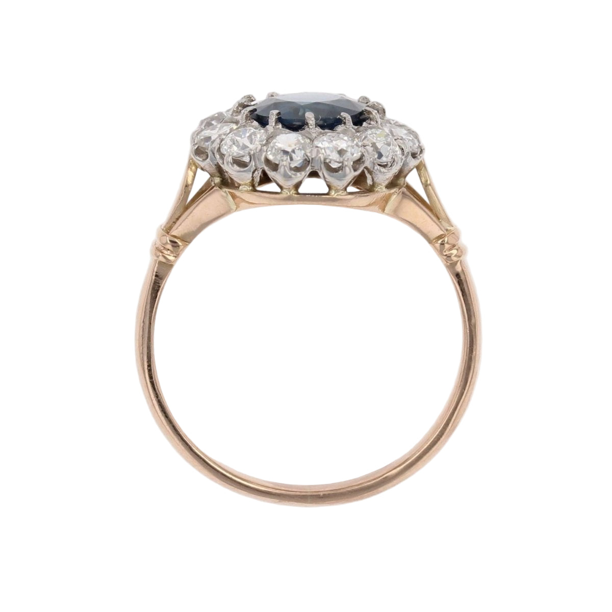 Bague marguerite ancienne en or rose et platine avec saphir et diamants - Castafiore