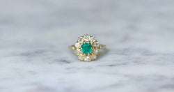 Bague marguerite émeraude et diamants - Castafiore
