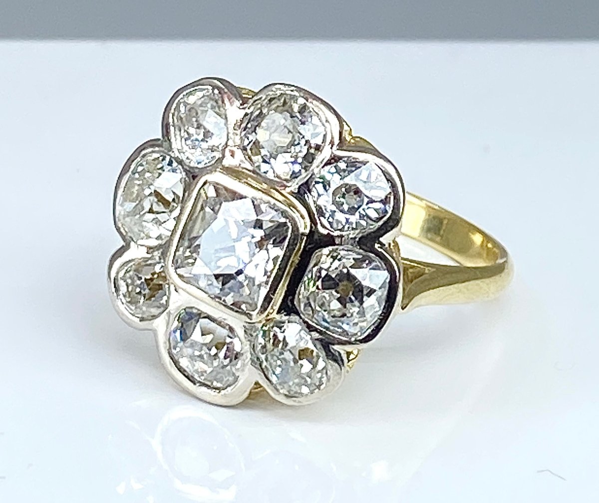 Bague marguerite en deux ors et diamants - Castafiore