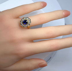 Bague marguerite en or 18 carats en saphir et diamants - Castafiore