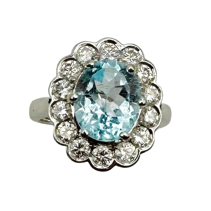 Bague Marguerite en or blanc, aigue - marine et diamants - Castafiore