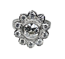 Bague marguerite en or blanc et diamant - Castafiore