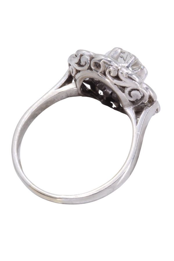 Bague marguerite en or blanc et diamants - Castafiore