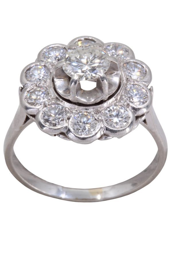 Bague marguerite en or blanc et diamants - Castafiore