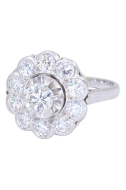 Bague marguerite en or blanc et diamants - Castafiore