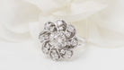 Bague marguerite en or blanc platine et diamants - Castafiore