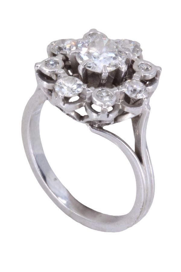 Bague marguerite en or blanc, platine et diamants - Castafiore