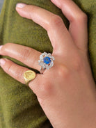 Bague Marguerite en or blanc, saphir et diamant - Castafiore