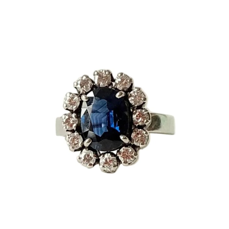 Bague Marguerite en or blanc, saphir, et diamants - Castafiore