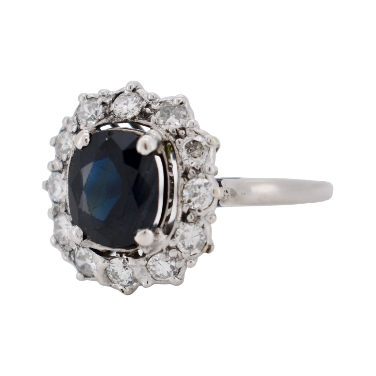 Bague Marguerite en or blanc, saphir et diamants - Castafiore