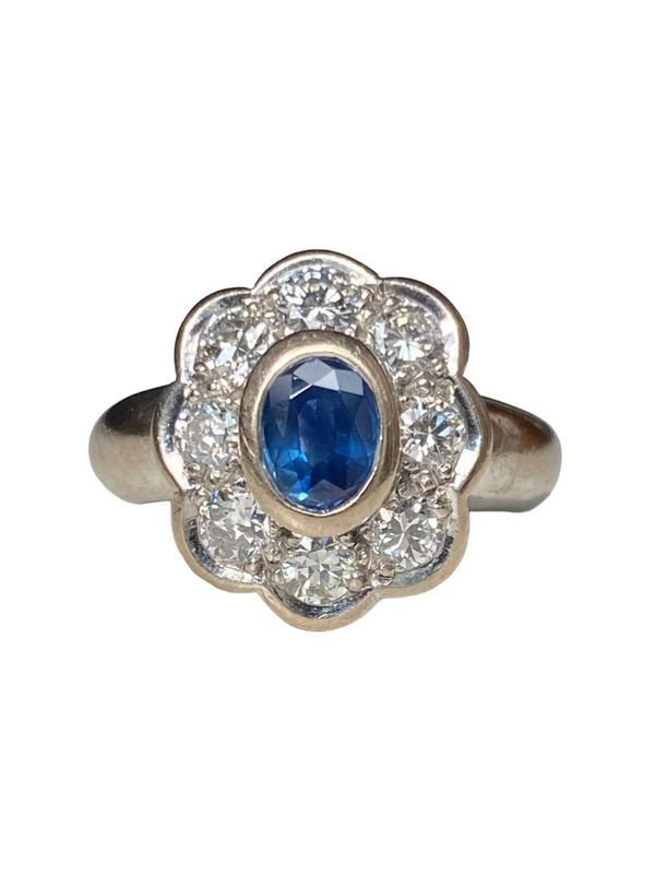 Bague marguerite en or blanc sertie d'un saphir - Castafiore