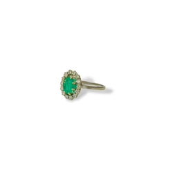 Bague marguerite en or gris et émeraude - Castafiore