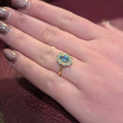 Bague Marguerite en or jaune diamants et aigue - marine - Castafiore