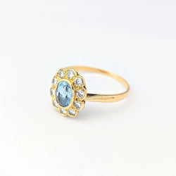 Bague Marguerite en or jaune diamants et aigue - marine - Castafiore