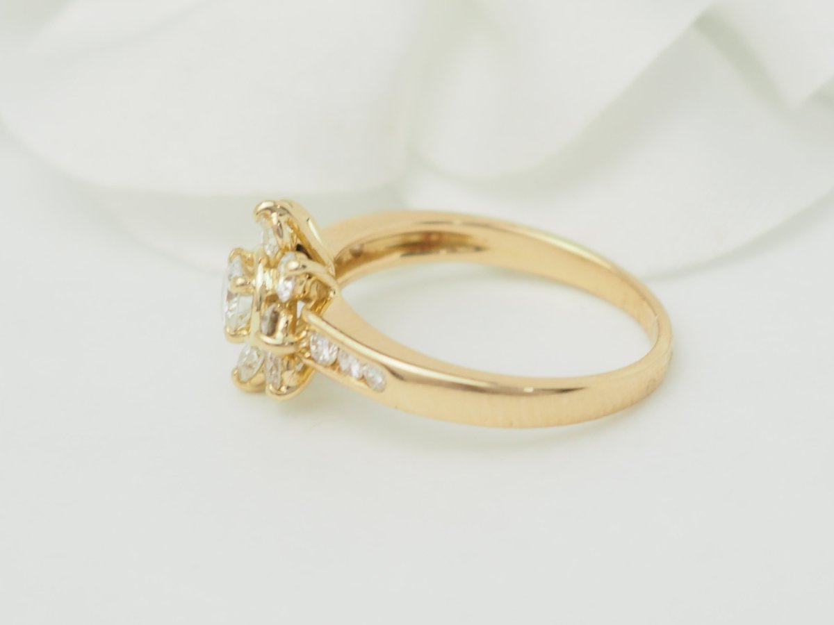 Bague marguerite en or jaune et diamants - Castafiore