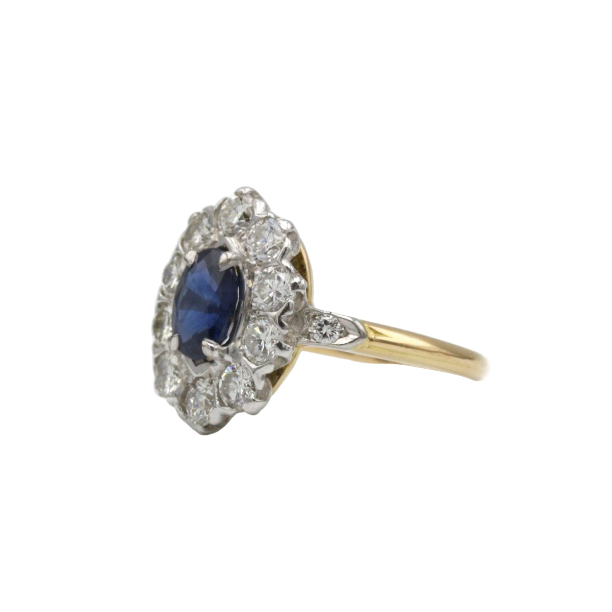 Bague marguerite en or jaune et platine avec diamants et saphir - Castafiore